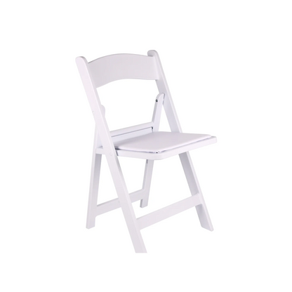 White resin folding chair with vinyl padded seat
